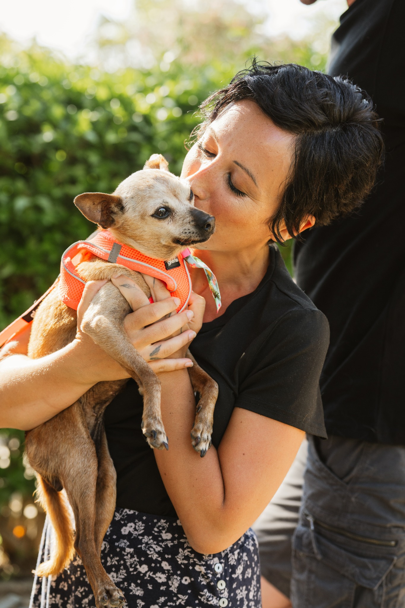 Katya Warrington with a dog outdoors